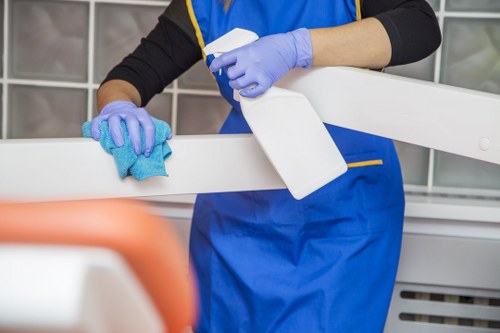 Professional cleaner maintaining a shared hallway